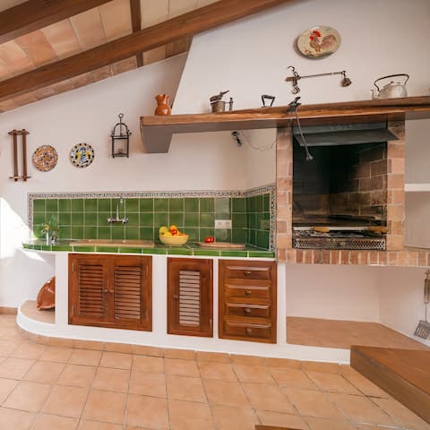 Light the barbecue and enjoy a meal outdoors in the Spanish sun