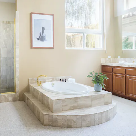 Relax and unwind in the sunken bathtub