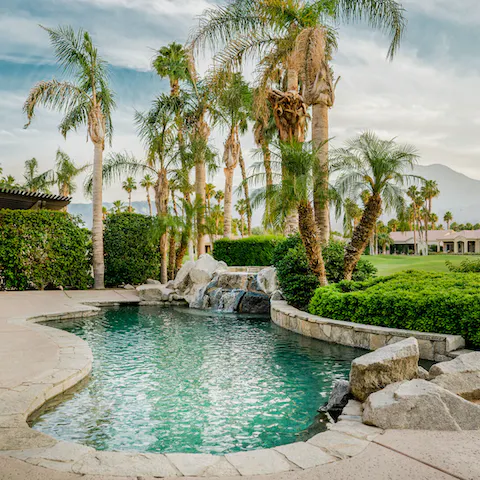 Chill out in the inviting freeform outdoor pool