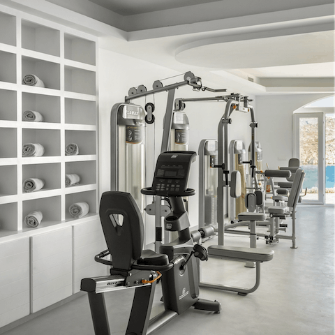 Get energised with a workout in the communal fitness centre