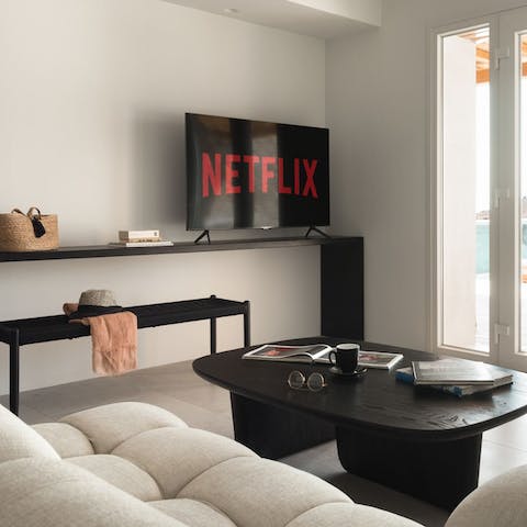 Snuggle up for a Netflix movie night in the bright living room