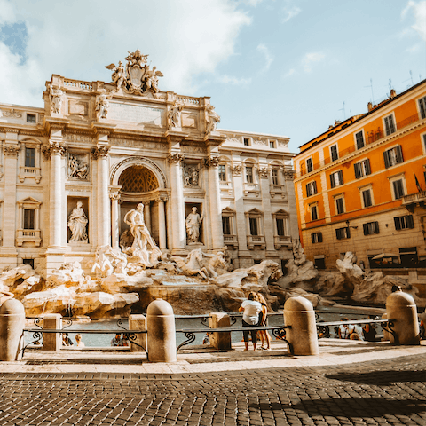 Throw a coin in the Trevi Fountain, just over a fifteen-minute walk from home