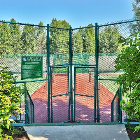 Have a game of tennis on the communal courts