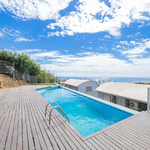 Step into the crystal-clear communal pool when you need cooling down