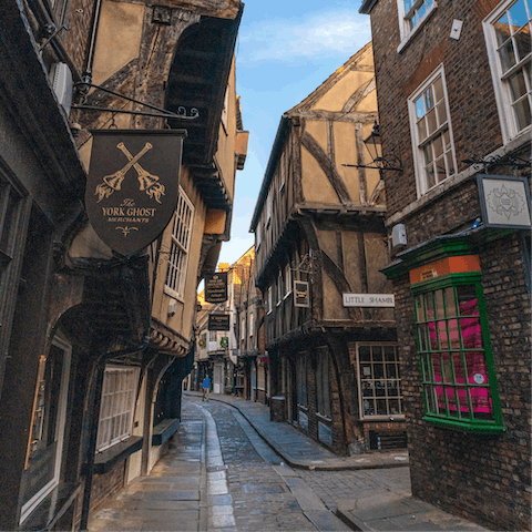 Stroll along the cobbled streets of York's historic shopping area, The Shambles is a ten-minute stroll