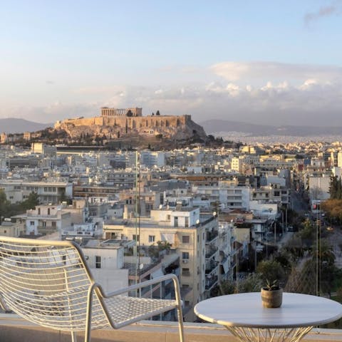 Admire stunning views across the Acropolis from the balcony