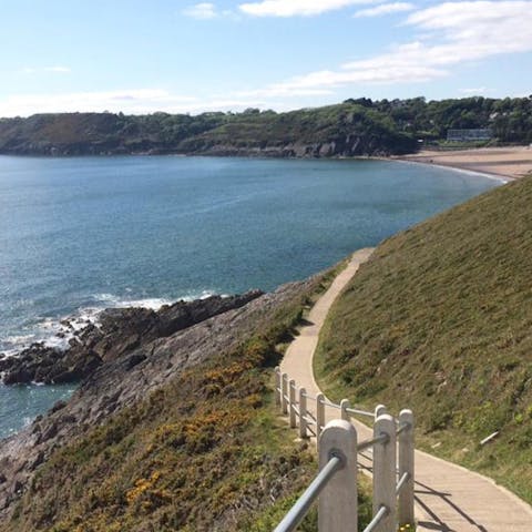 Follow the coastal walking path along Swansea Bay from just outside your front door
