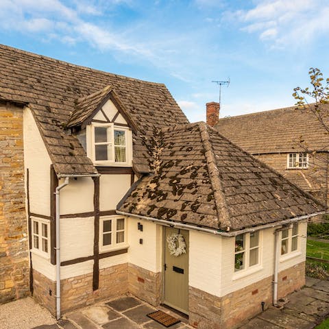 Admire the cute, traditional exterior of this Grade II listed home
