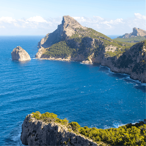 Explore the rugged landscapes of the island's northernmost point, Cap de Formentor