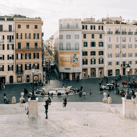 Ascend the iconic Spanish Steps after a glass of chianti, less than 2 km from home