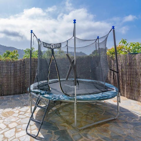 Watch on as the little ones bounce around on the trampoline