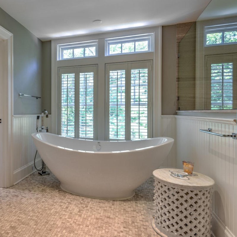 Soak in the tub with a glass of wine