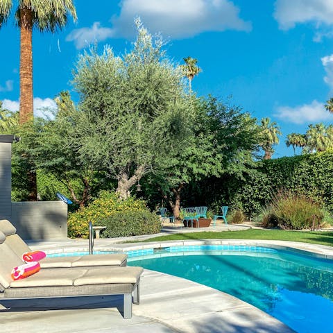 Bask in the Palm Springs sun by the pool
