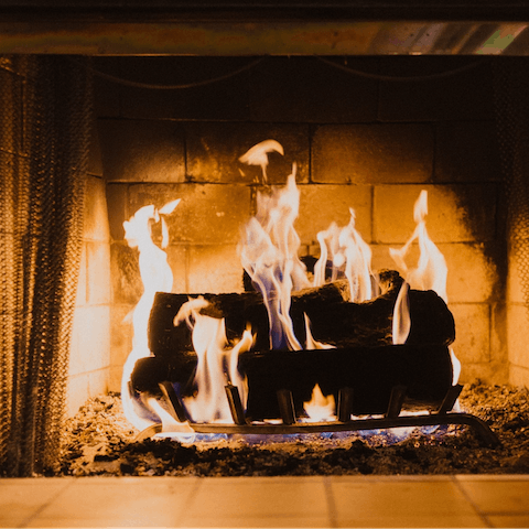 Spend cosy evenings cuddled up next to the fireplace