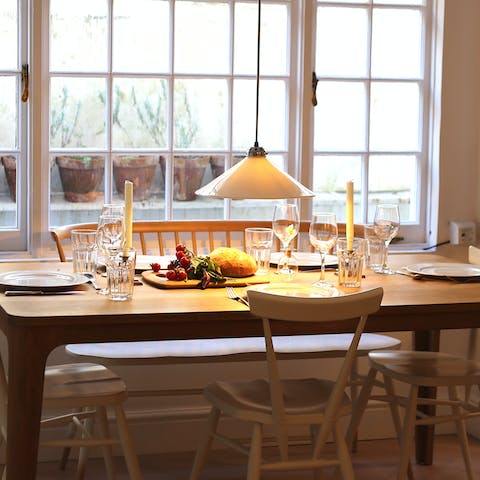 Sit down to a celebratory meal at the elegant dining table 