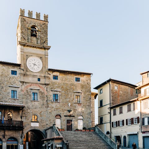 Explore the charming town of Cortona, a short drive away