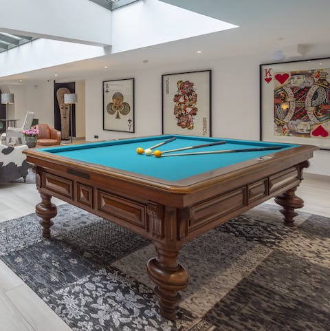 Play pool with other residents in the stylish lobby 
