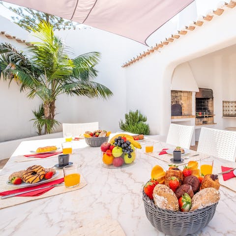 Start your days with pastel de natas at the alfresco dining area