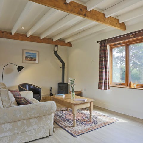 Spend quiet afternoons curled up with a book in front of the wood-burning stove
