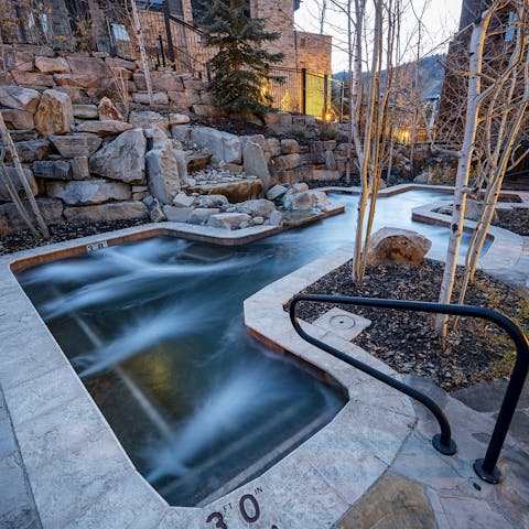 Treat yourself to a post-ski soak in the lagoon-style outdoor hot tub