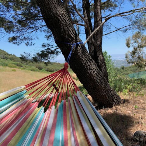 Enjoy an afternoon siesta as you sway gently in the sea breeze