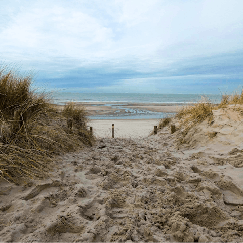 Sink your toes in the sand at nearby Strand De Haan