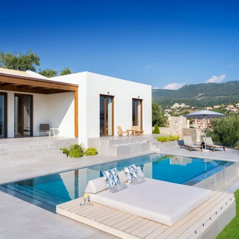 Laze away afternoons around the elegant outdoor pool