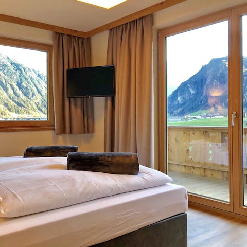 Wake up to gorgeous views of Austrian mountains out through the bedroom windows