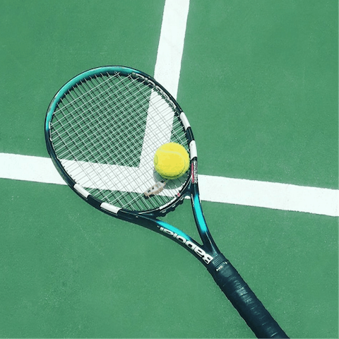 Book in a round of tennis at the nearby club within walking distance 