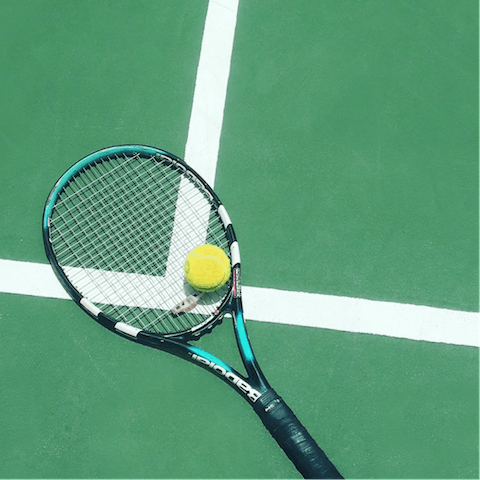 Work on your serve at the outdoor tennis courts in the summer