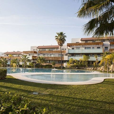 Swim in the communal pool to cool off in the Costa del Sol heat