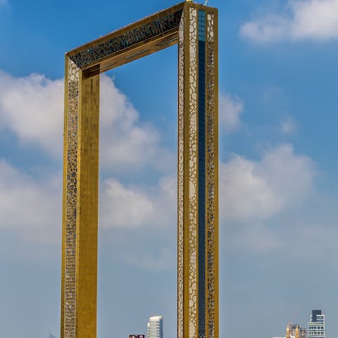 Enjoy a bird's eye view of the city from the Dubai Frame, a short drive from your home
