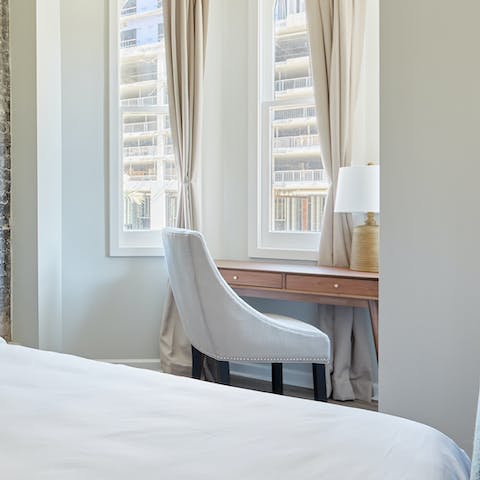 Catch up at the desk space while enjoying Big Easy views