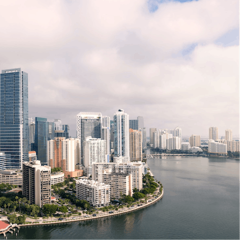 Reach Downtown Miami within twenty minutes by car and soak up its culture