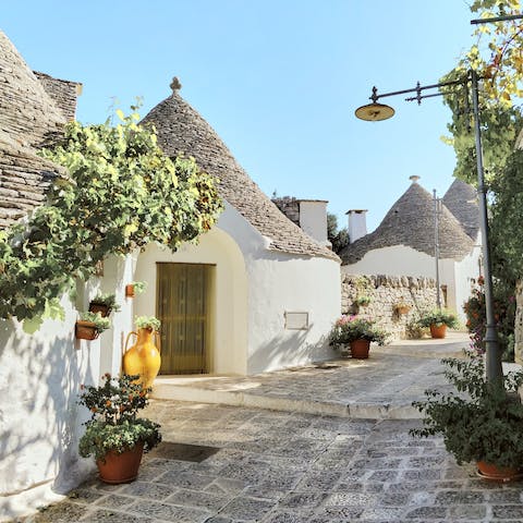 Stay on the outskirts of the charming Unesco-listed town of Alberobello, home to more than 1,000 whitewashed trulli