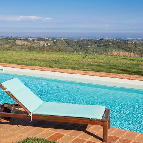 Cool off in the pool and take in sweeping views