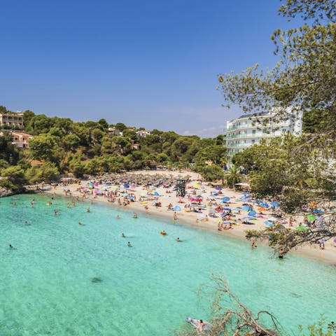 Bask in the sunshine on Santanyí Beach, around 8 kilometres away