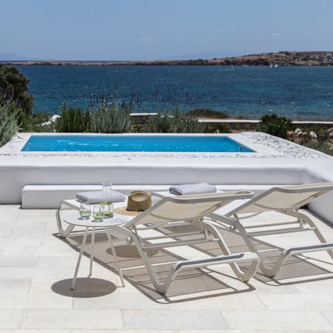 Take a refreshing dip in the plunge pool and admire the Cycladic vista