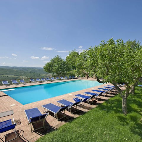 Relax by the outdoor pool