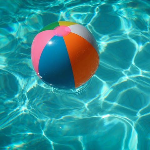 Lounge by the shared pool, indulging in your holiday read and cooling off from the desert heat