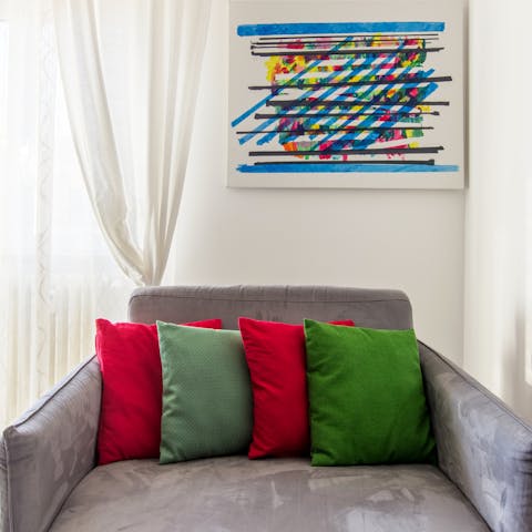 Enjoy pops of vibrant colour courtesy of modern artworks