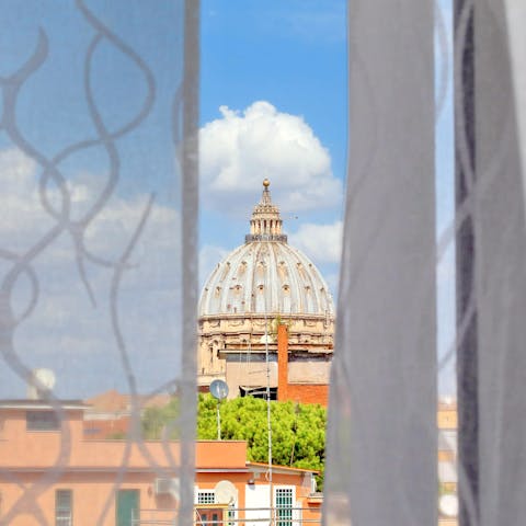 Catch a glimpse of the Vatican's dome from the bedroom window
