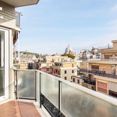 Head out to the private balcony for an aperitivo looking out over the rooftops