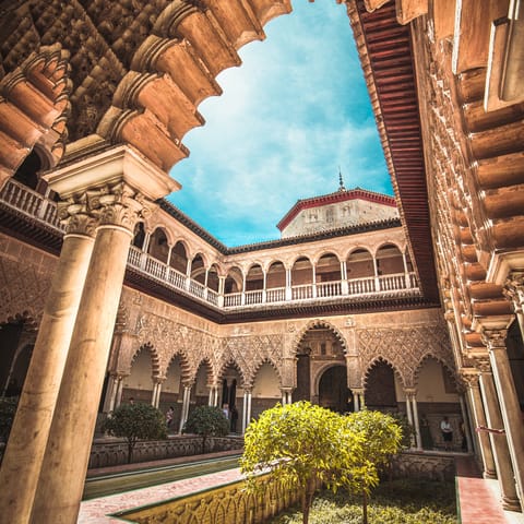 Visit the stunning Real Alcázar of Seville – it's within walking distance