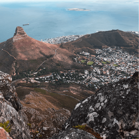 Visit iconic Table Mountain, a short ten-minute drive from your apartment