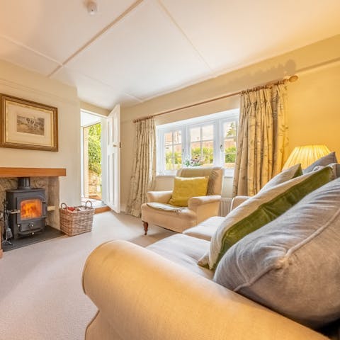Curl up beside the wood-burning stove after walks across the Downs