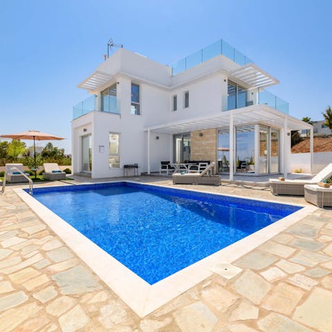 Bask in the sun, slipping into the crystalline private pool when you need cooling down