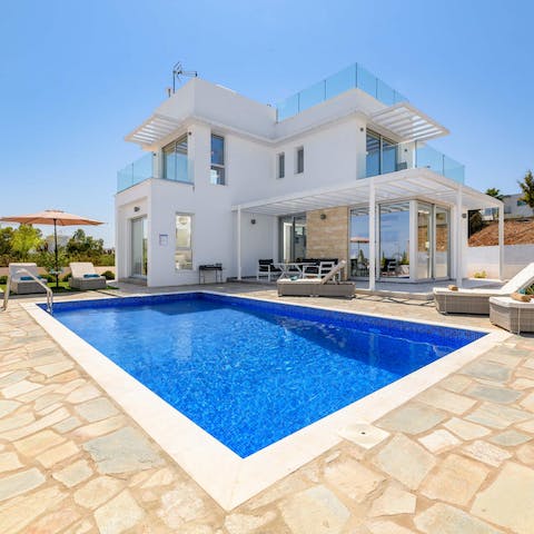 Bask in the sun, slipping into the crystalline private pool when you need cooling down