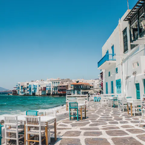 Reach the waterfront cocktail bars and tavernas of Mykonos Town in ten minutes by car