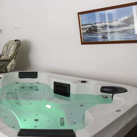 Treat yourself to a luxurious soak in the Jacuzzi tub